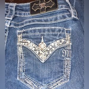 Women’s miss me boot cut jeans with blingy pockets!